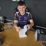Caleb McDuff with book