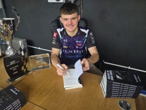 Caleb McDuff with book